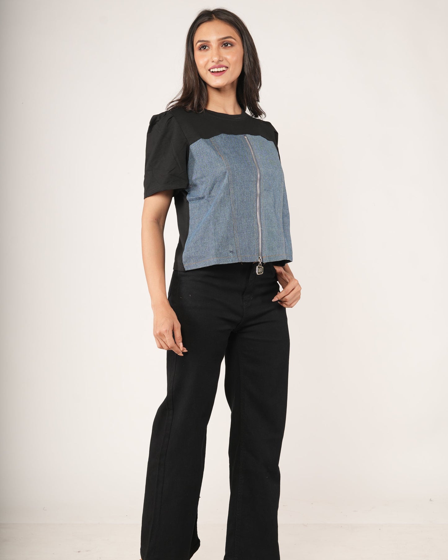 Woman wearing a Black & Denim Colourblock Zip-Front Top.