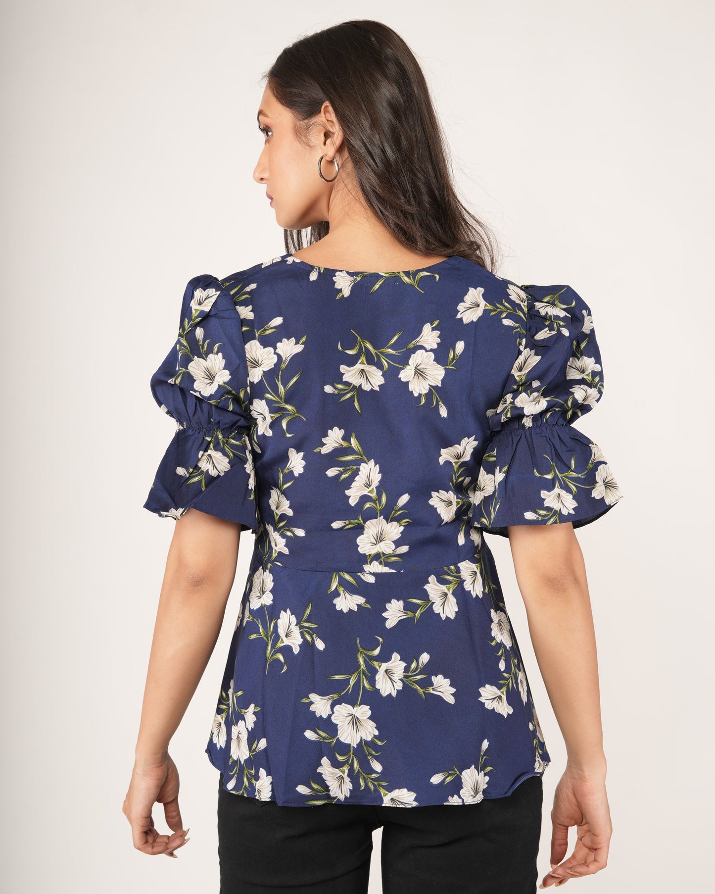 Women wearing a Botanical Floral Puff Sleeve Peplum Top