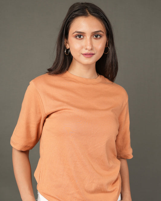 Women wearing Peach/orange t-shirt.