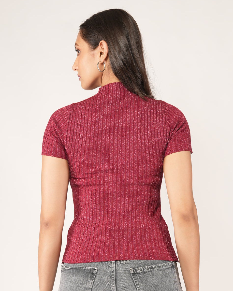 A woman modeling a Short-sleeve Fiesta Red Sheer Mesh Yoke Rhinestone Ribbed Top, paired with gray jeans.