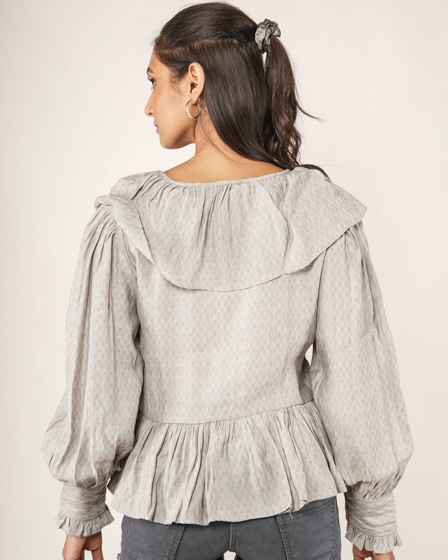 Women wearing a Textured Ruffle Collar Peplum Top — Dove Grey
