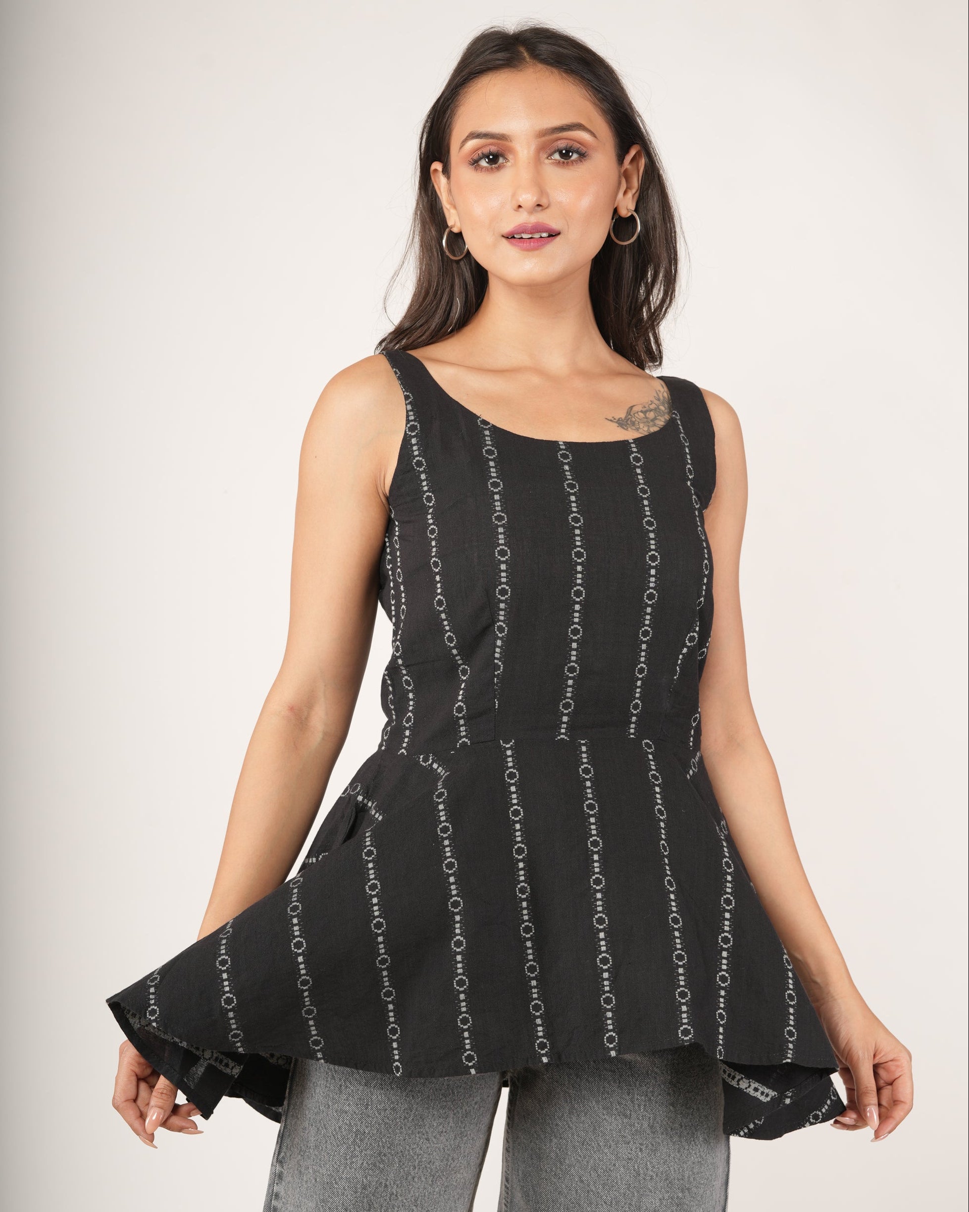 Women wearing Black striped flared top