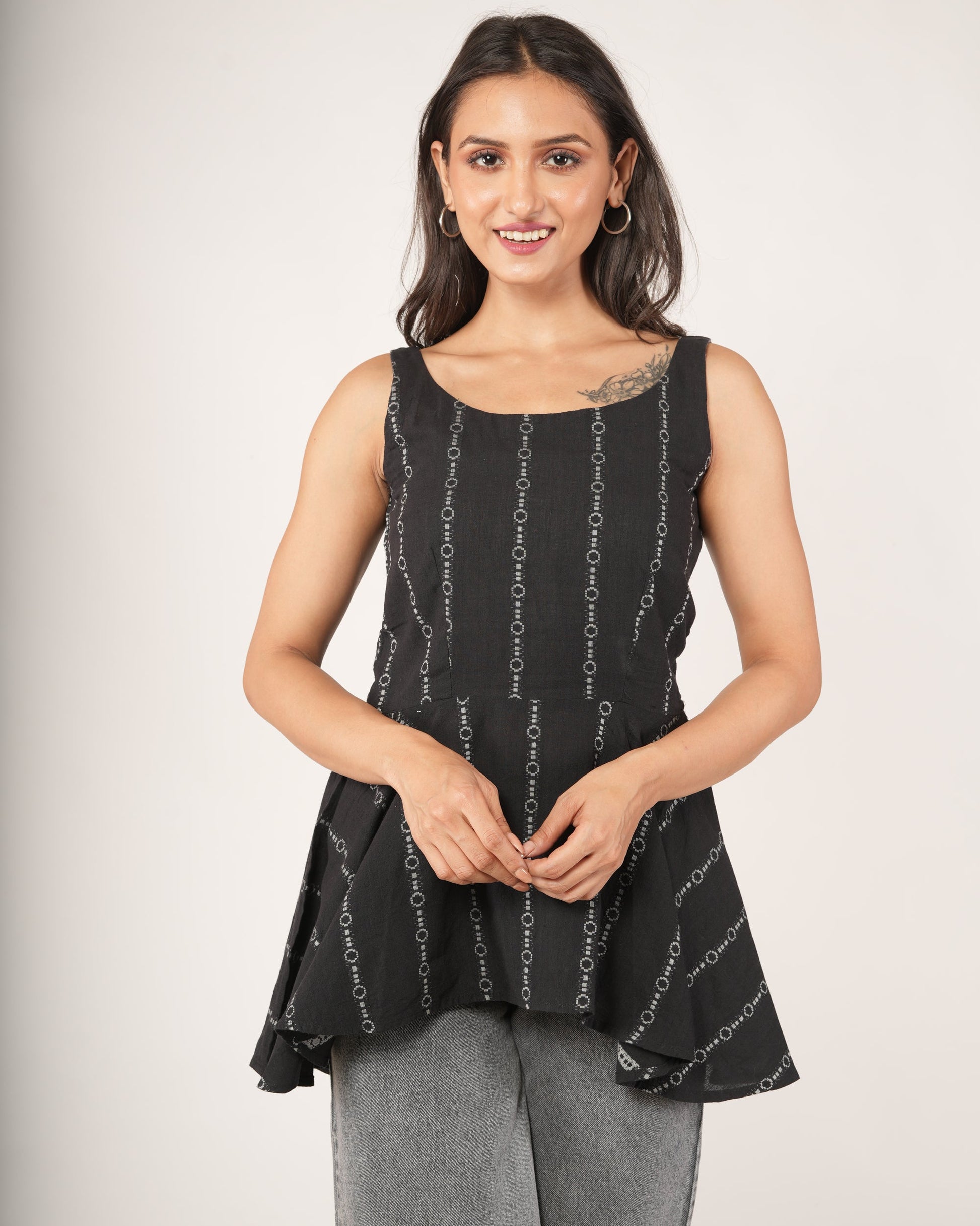 Women wearing Black striped flared top
