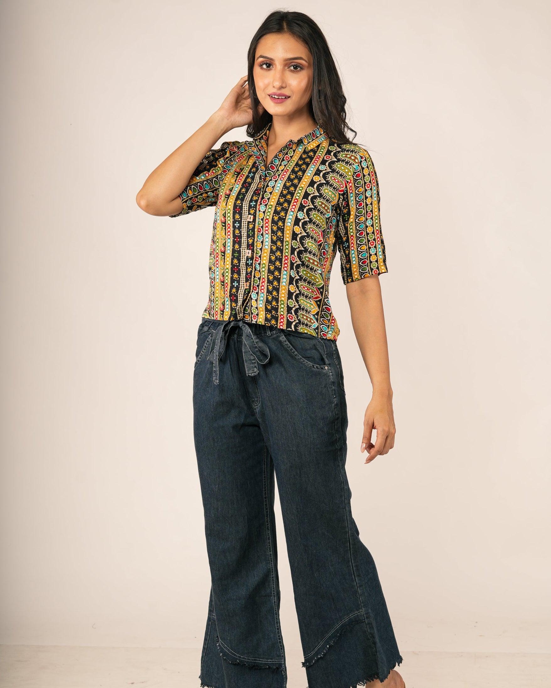 Woman wearing a Bohemian Geometric Vertical Stripe Shirt