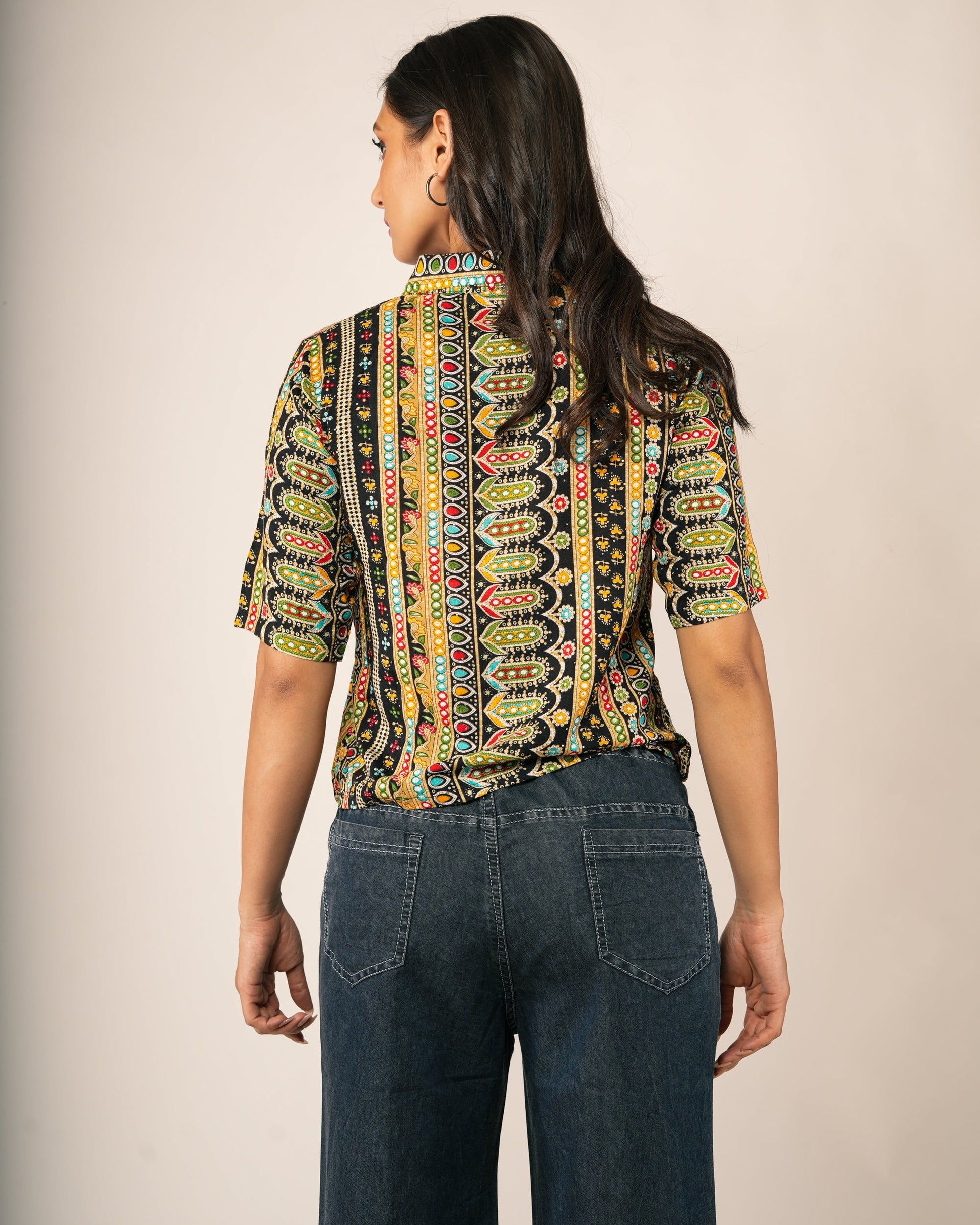 Woman wearing a Bohemian Geometric Vertical Stripe Shirt