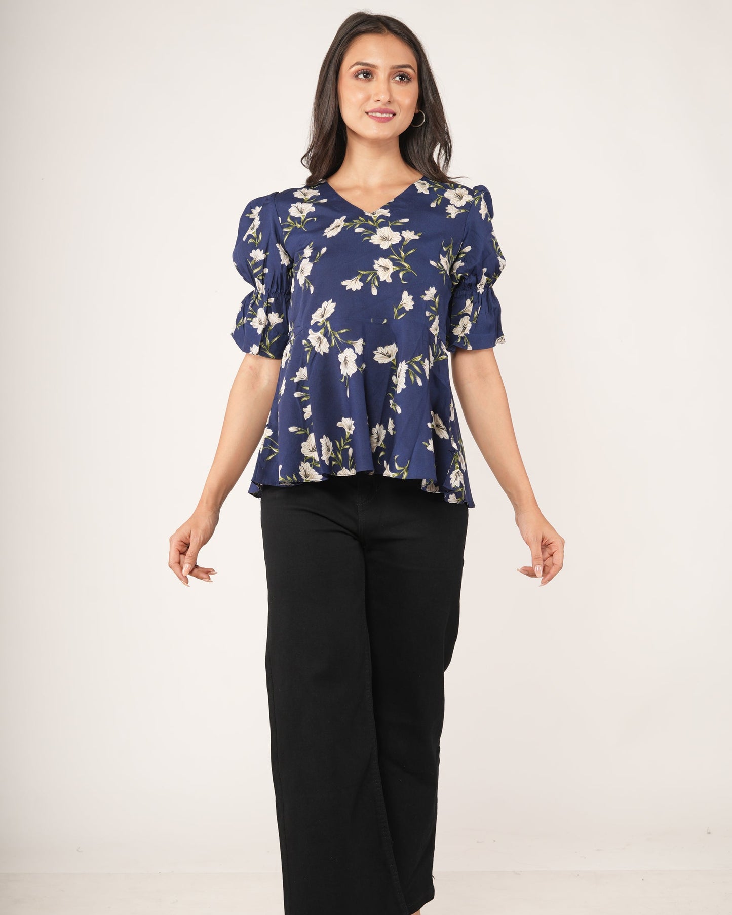 Women wearing a Botanical Floral Puff Sleeve Peplum Top