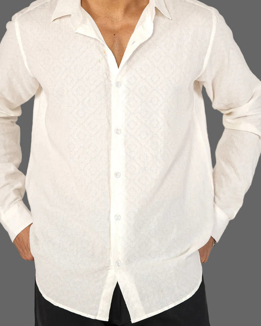 White button-up shirt worn by a person with a neutral background