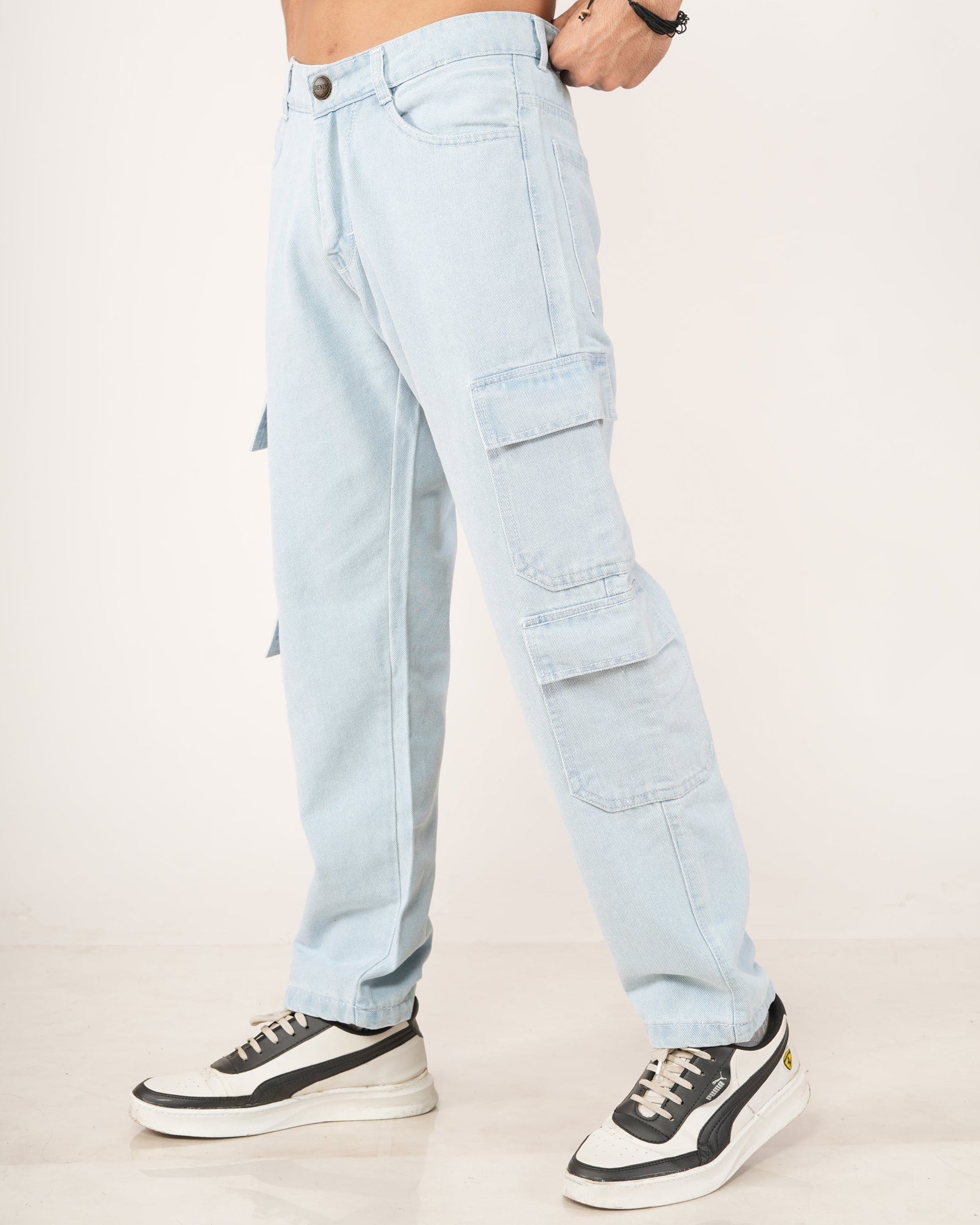 A model wearing Frost Ice Blue 8-pocket cargo jeans
