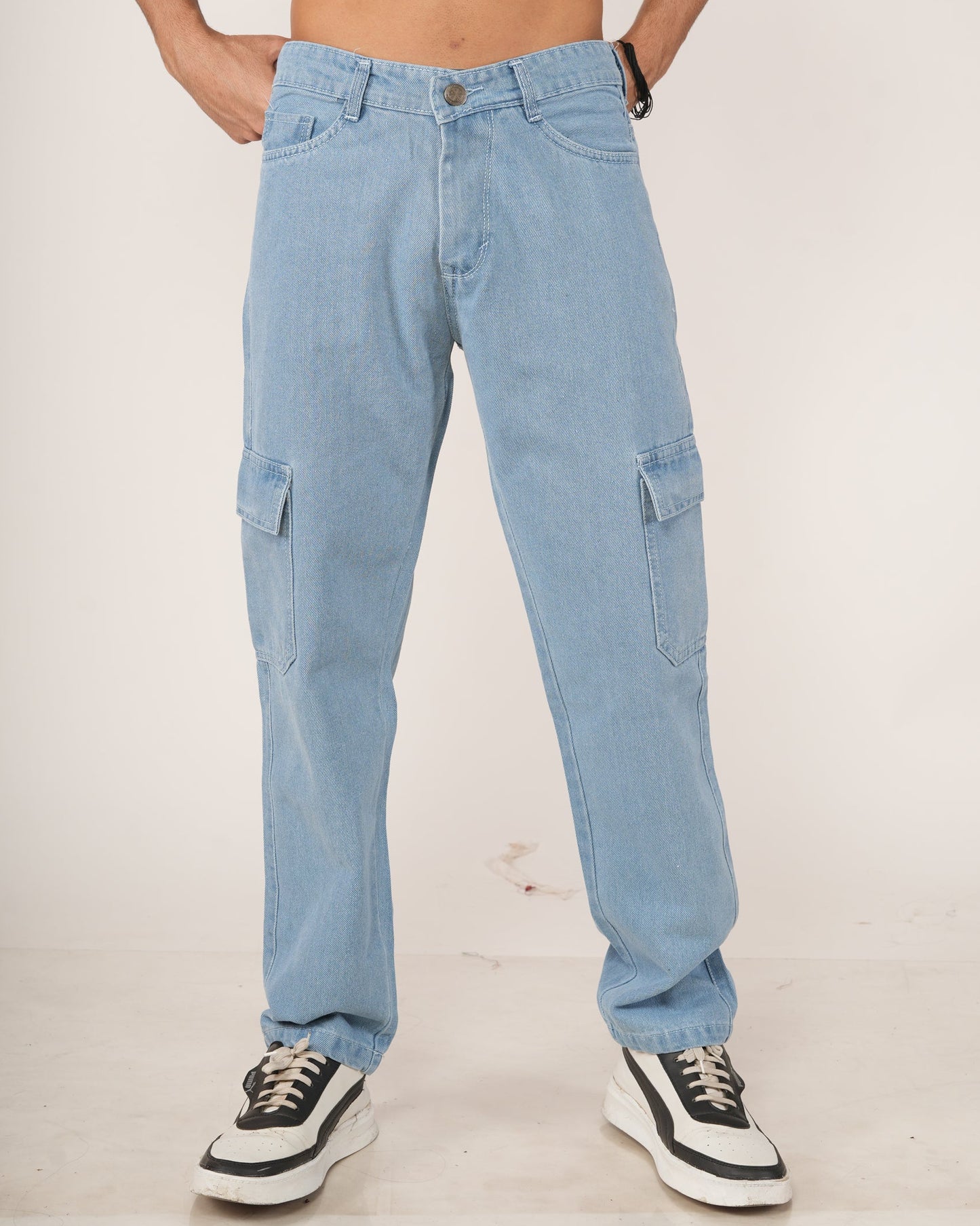 Person wearing sky blue jeans.
