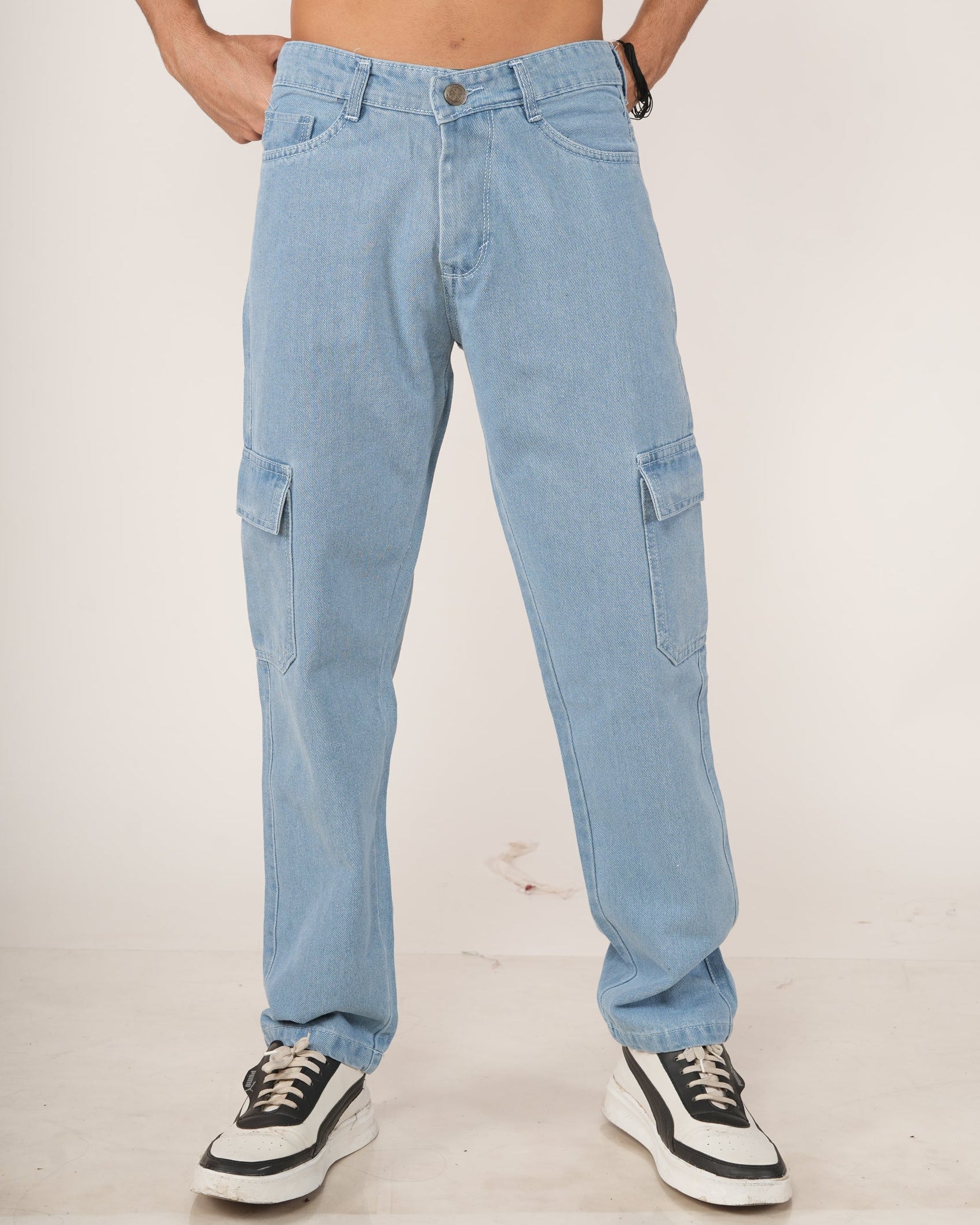 Person wearing sky blue jeans.