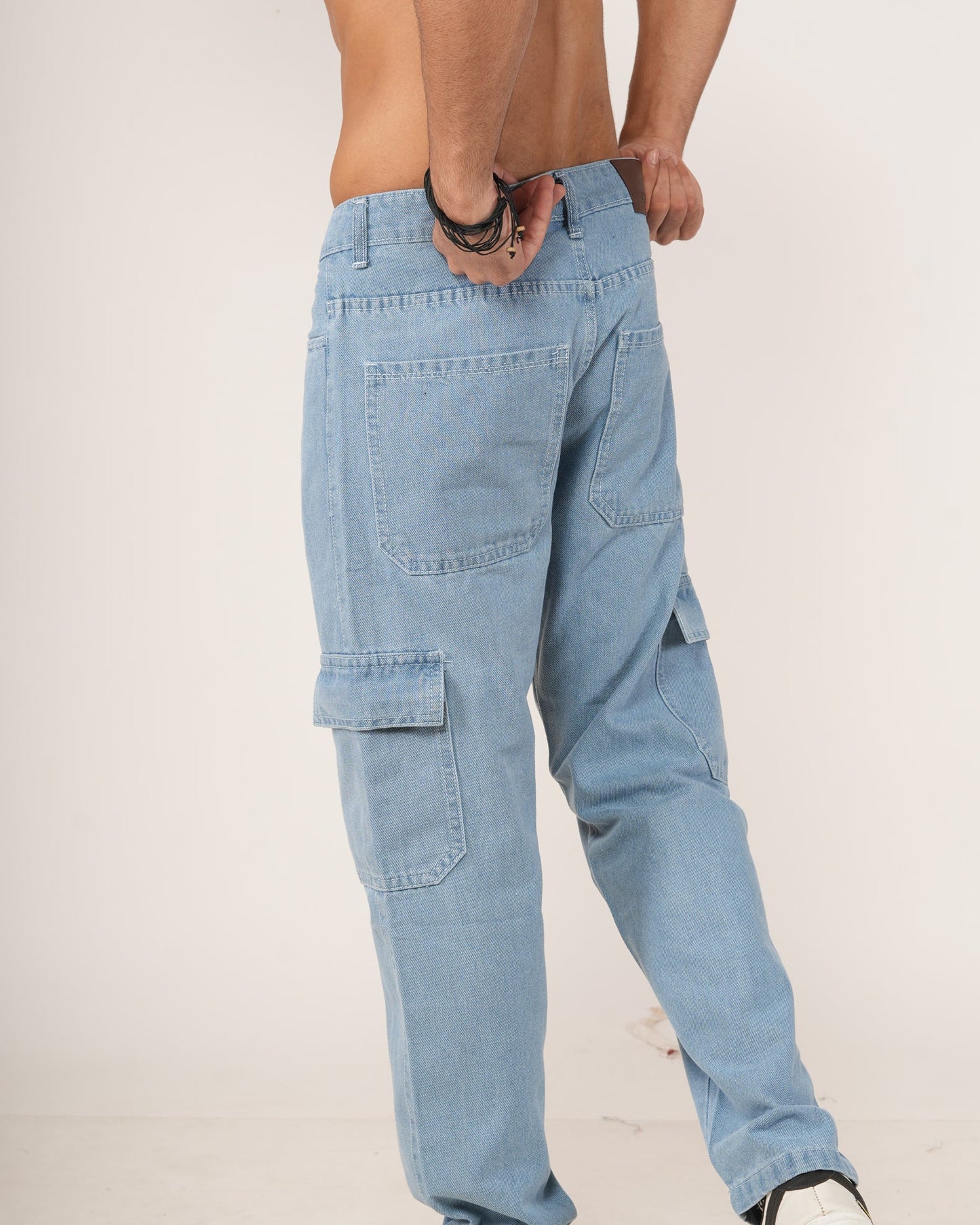 Person wearing sky blue jeans.