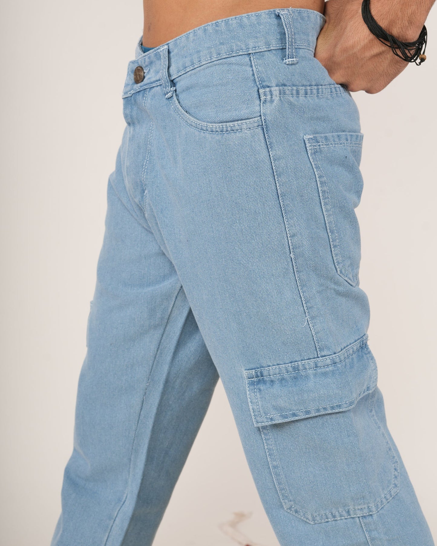 Person wearing sky blue jeans.