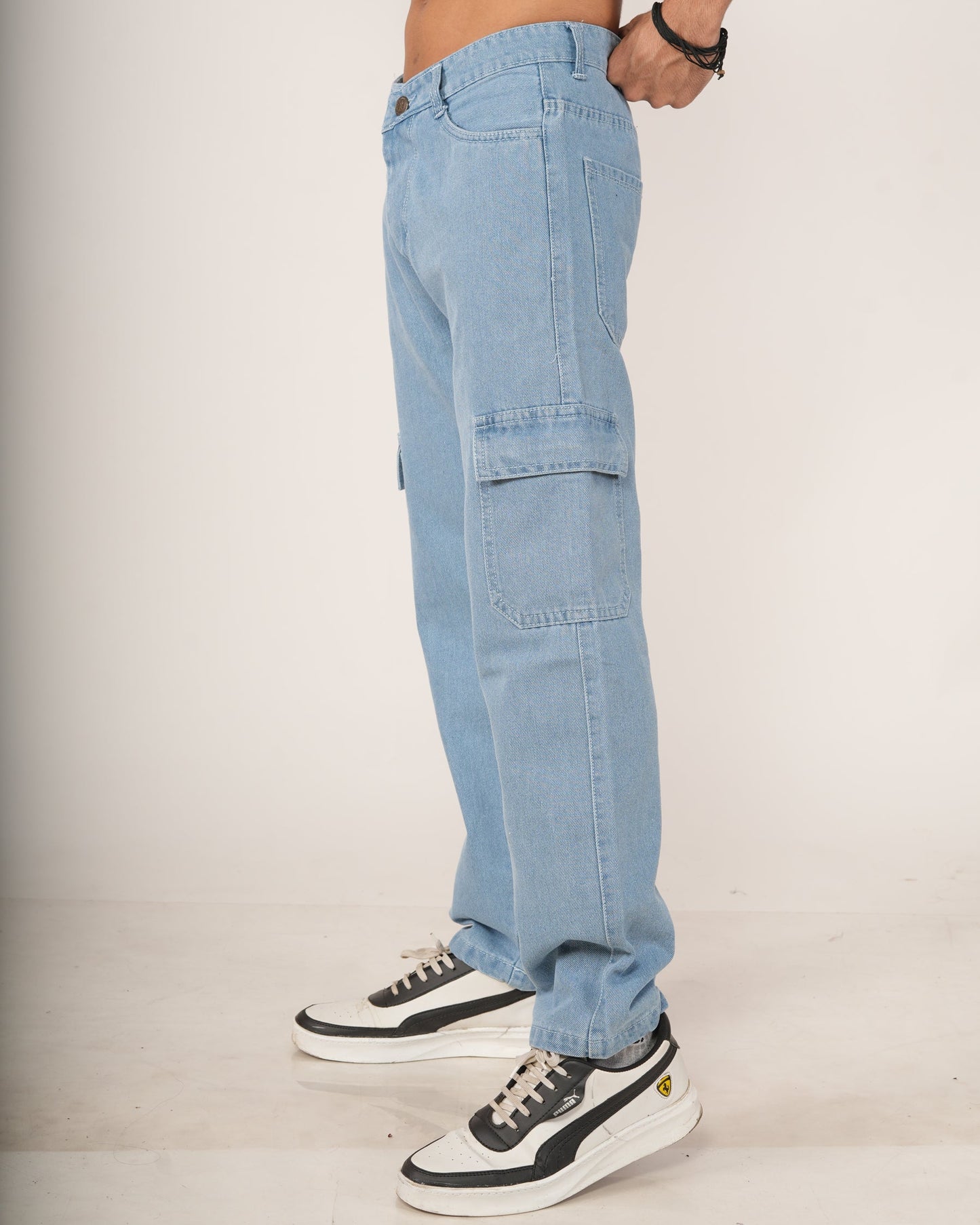 Person wearing sky blue jeans.