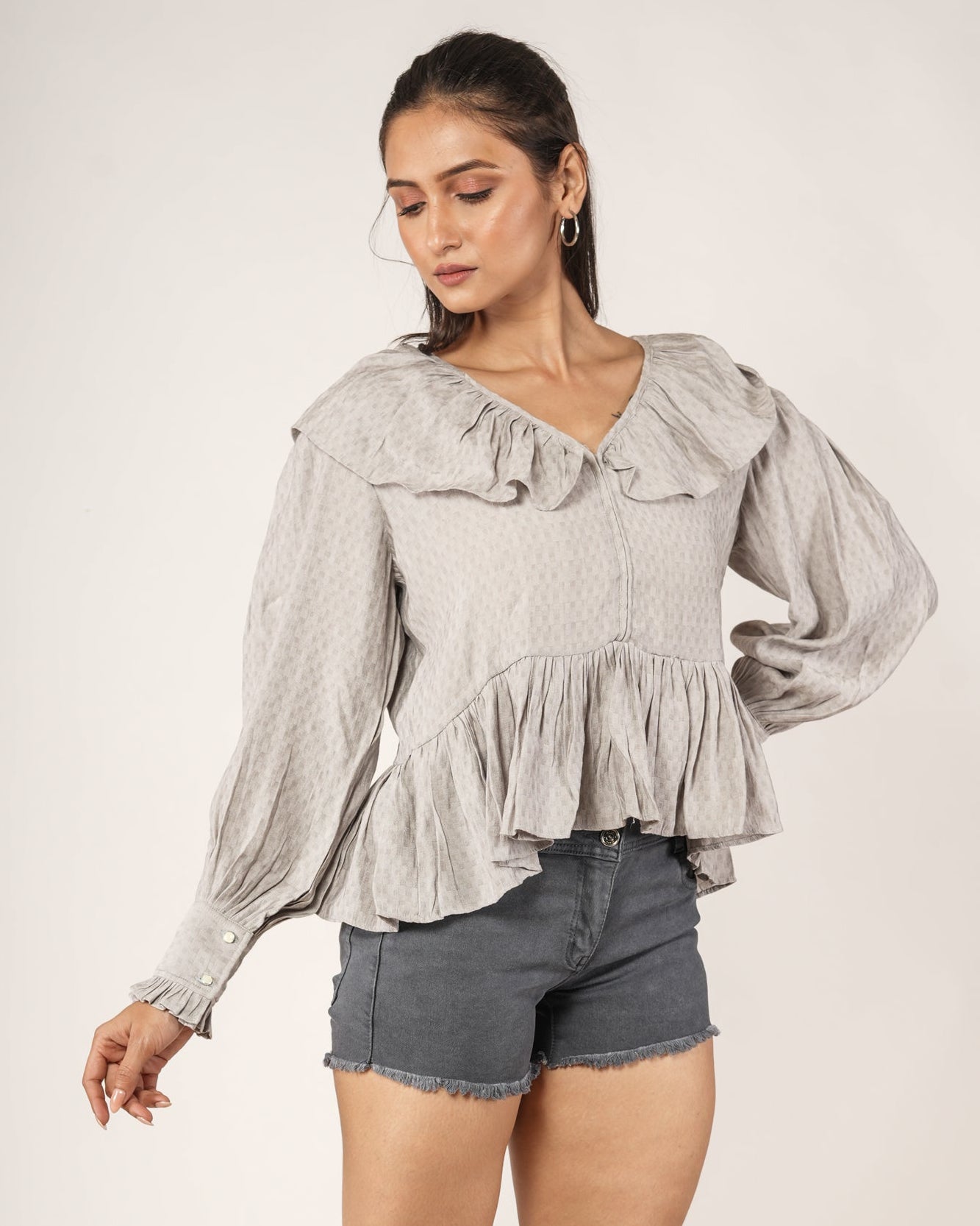 Women wearing a Textured Ruffle Collar Peplum Top — Dove Grey