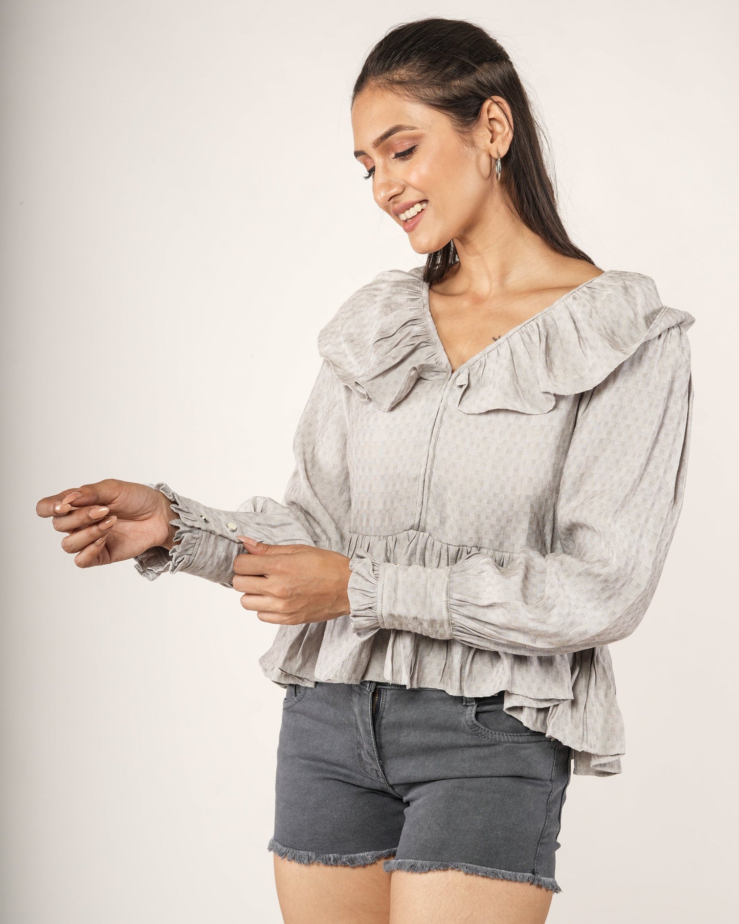 Women wearing a Textured Ruffle Collar Peplum Top — Dove Grey