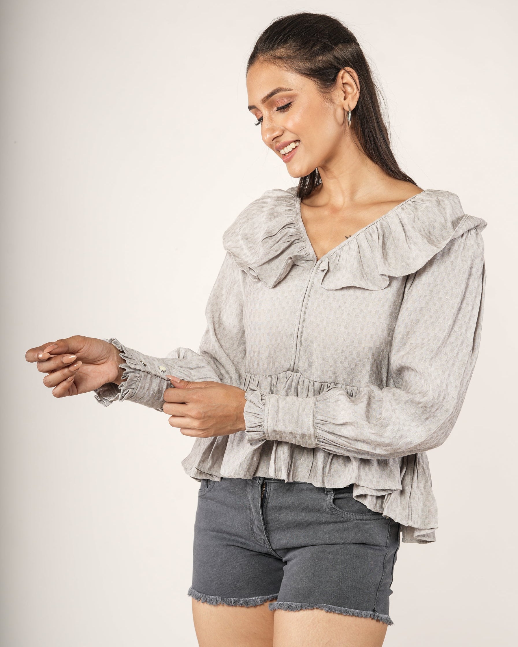 Women wearing a Textured Ruffle Collar Peplum Top — Dove Grey