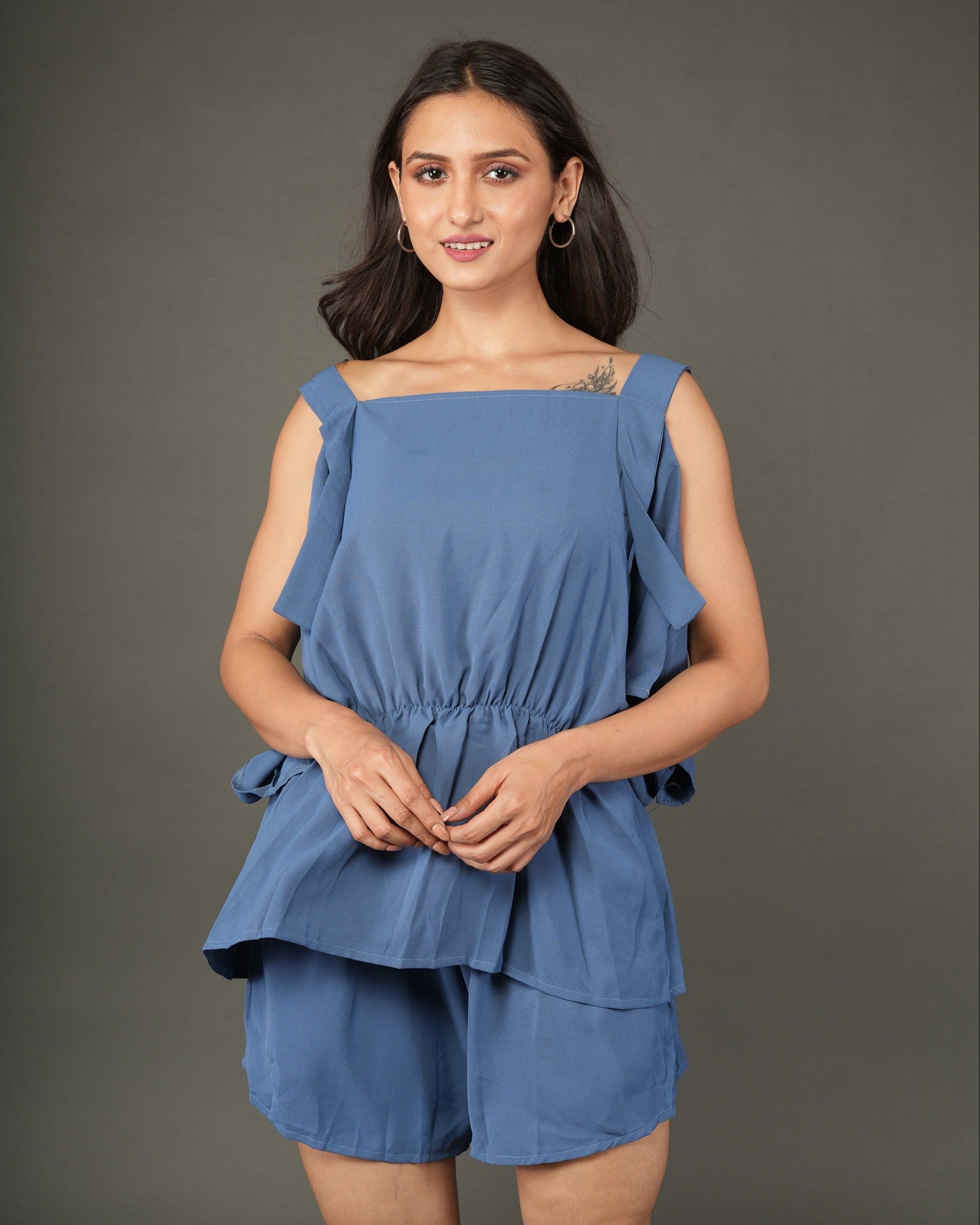 Woman wearing a blue layered outfit