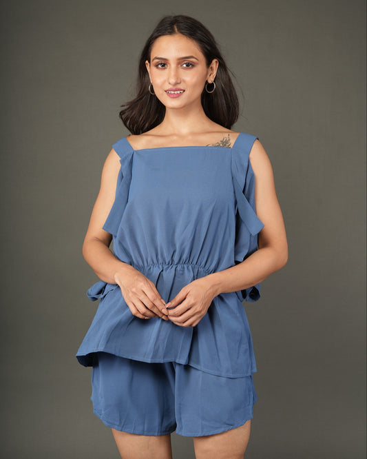 Woman wearing a blue layered outfit