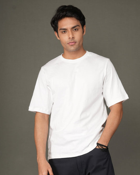 A man with a white crew-neck t-shirt